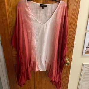 Rust and ivory poncho top